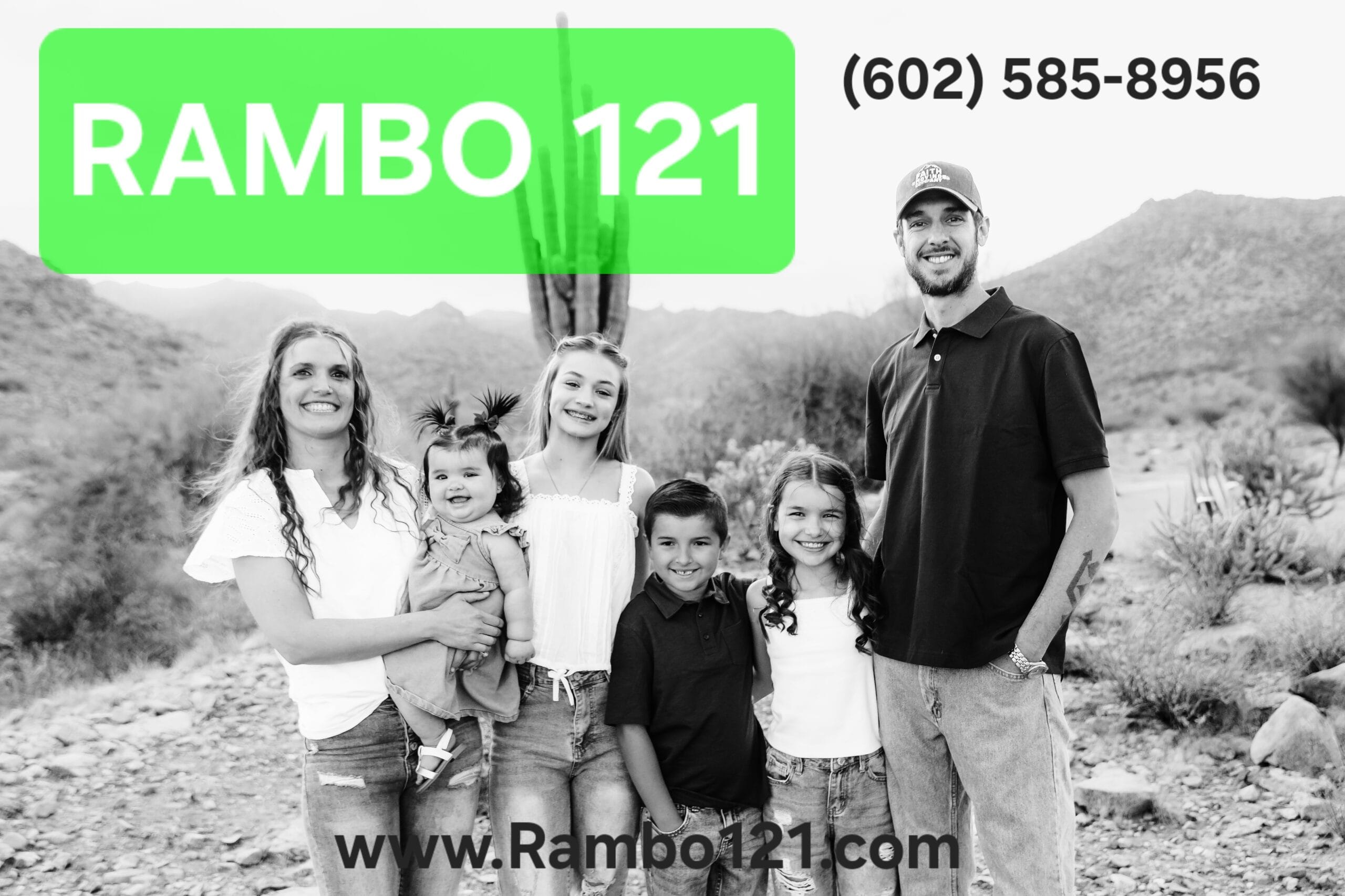 Meet The Founder 1 Rambo 121 Movers family team standing in the Arizona desert with company branding, showcasing the people behind the trusted moving service.